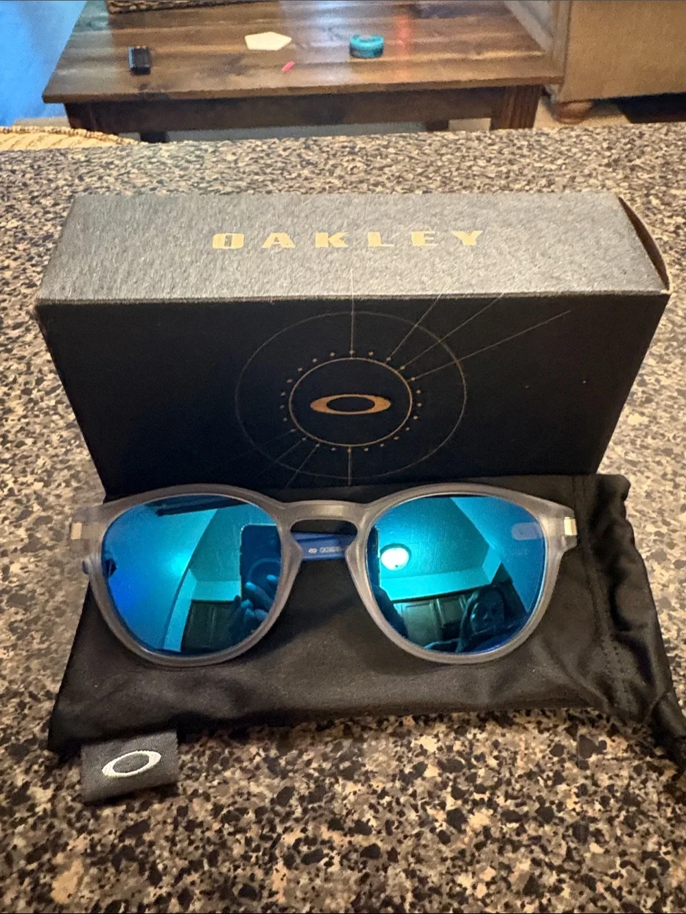 Oakley Round Sunglasses Frosted Gray Frames with Blue Mirrored Lenses